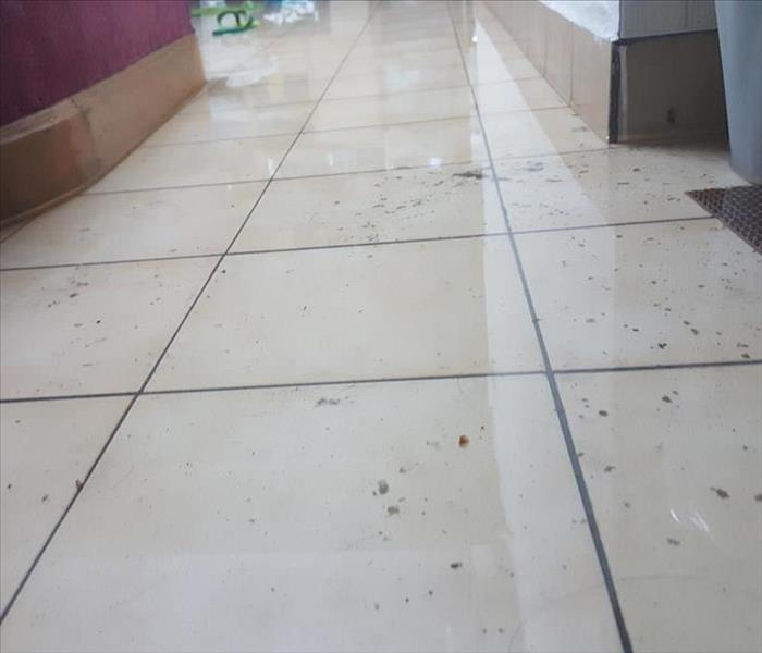 water on the floor of a commercial building